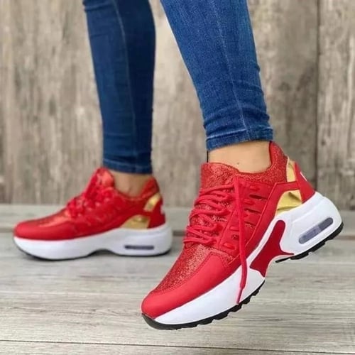 Red orthopedic comfort sneakers for women with gold accents, featuring cushioned soles and stylish design, perfect for casual wear and support.