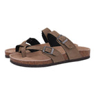 Brown leather sandals with adjustable buckles, cork footbed, and rubber sole. Comfortable, stylish footwear for casual wear. Perfect for summer.