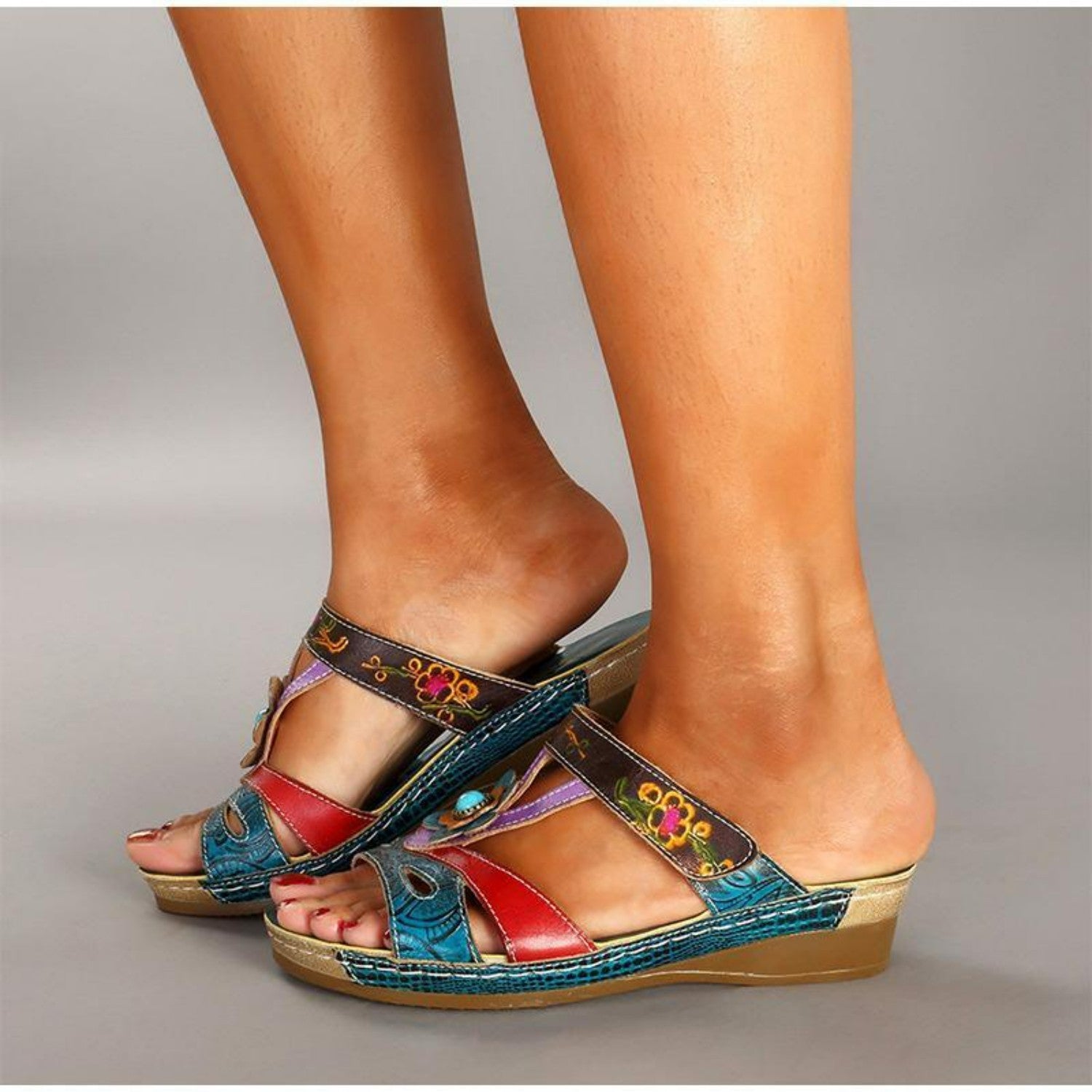 Women's colorful wedge sandals with floral embroidery, open-toe design, and multicolor leather straps. Perfect for summer fashion and casual wear.