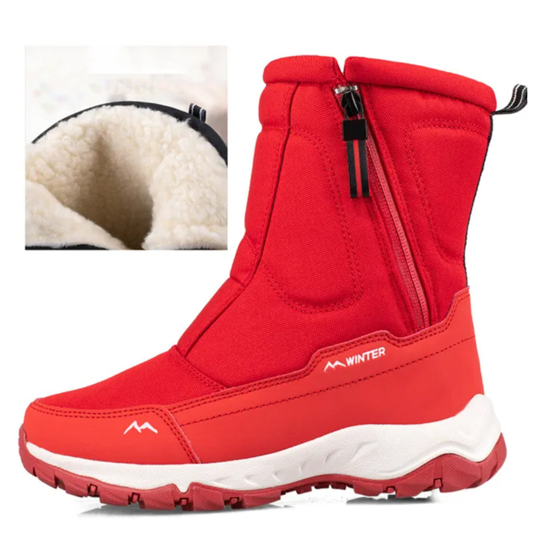 Red winter boots with plush lining, side zipper, and durable sole. Ideal for cold weather. Stylish, warm, and comfortable footwear for winter.