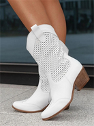 White breathable cowboy boots with perforated design, wooden heel, and pull tabs. Stylish women's western footwear for fashion and comfort.