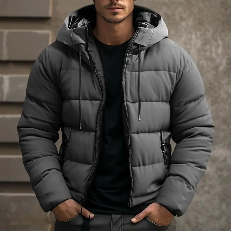 Gray men's puffer jacket with hood, zipper closure, and pockets, ideal for winter fashion.