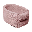 Pink knitted pet bed with a cozy, textured design, perfect for small dogs or cats. Soft, durable, and stylish pet accessory for comfort and warmth.