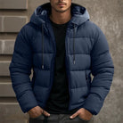 Men's navy blue puffer jacket with hood, zipper closure, winter outerwear.