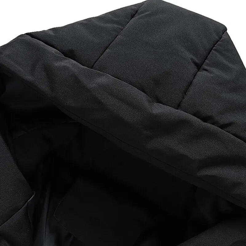 Black puffer jacket hood, quilted design, winter outerwear, insulated, warm clothing accessory.