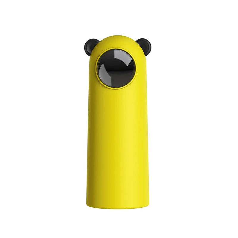 Yellow bear-shaped automatic soap dispenser with black ears and sensor, ideal for touchless hand hygiene in bathrooms and kitchens.