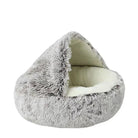 Cozy gray faux fur cat bed cave, plush and soft, perfect for pet comfort and warmth.