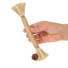 Hand holding a natural sisal and straw cat toy with a dangling ball, eco-friendly pet accessory for interactive play, durable and safe for cats.