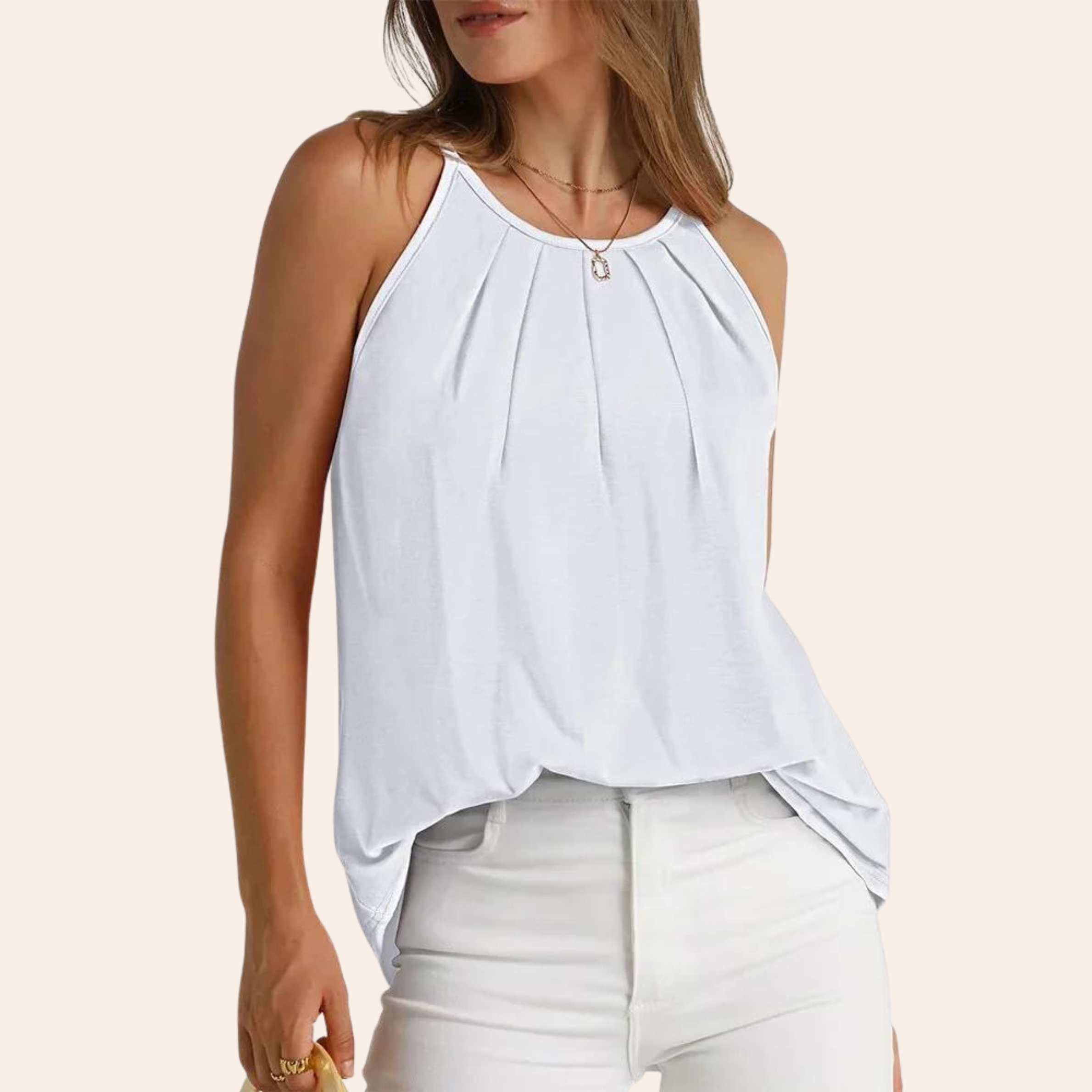 Woman wearing a sleeveless white pleated tank top with scoop neckline, paired with white jeans. Casual summer fashion, stylish women's clothing.