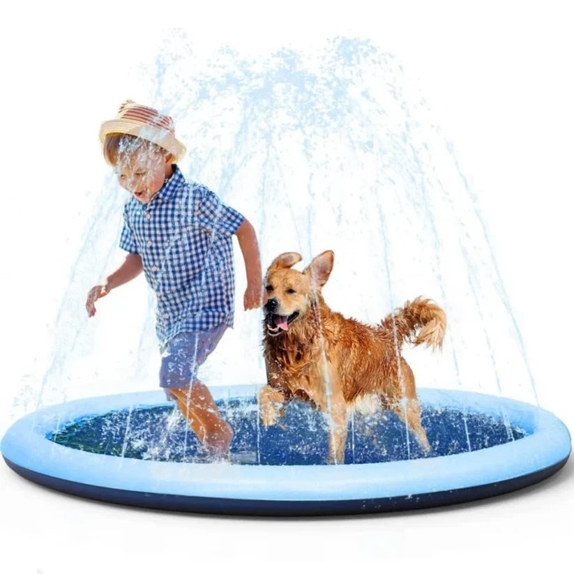 Child and dog playing in a blue splash pad with water fountain, summer outdoor fun, pet-friendly water play, backyard activity for kids and pets.