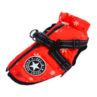 Red dog winter coat with snowflake pattern, adjustable black harness, and zipper closure. Pet fashion apparel for cold weather.