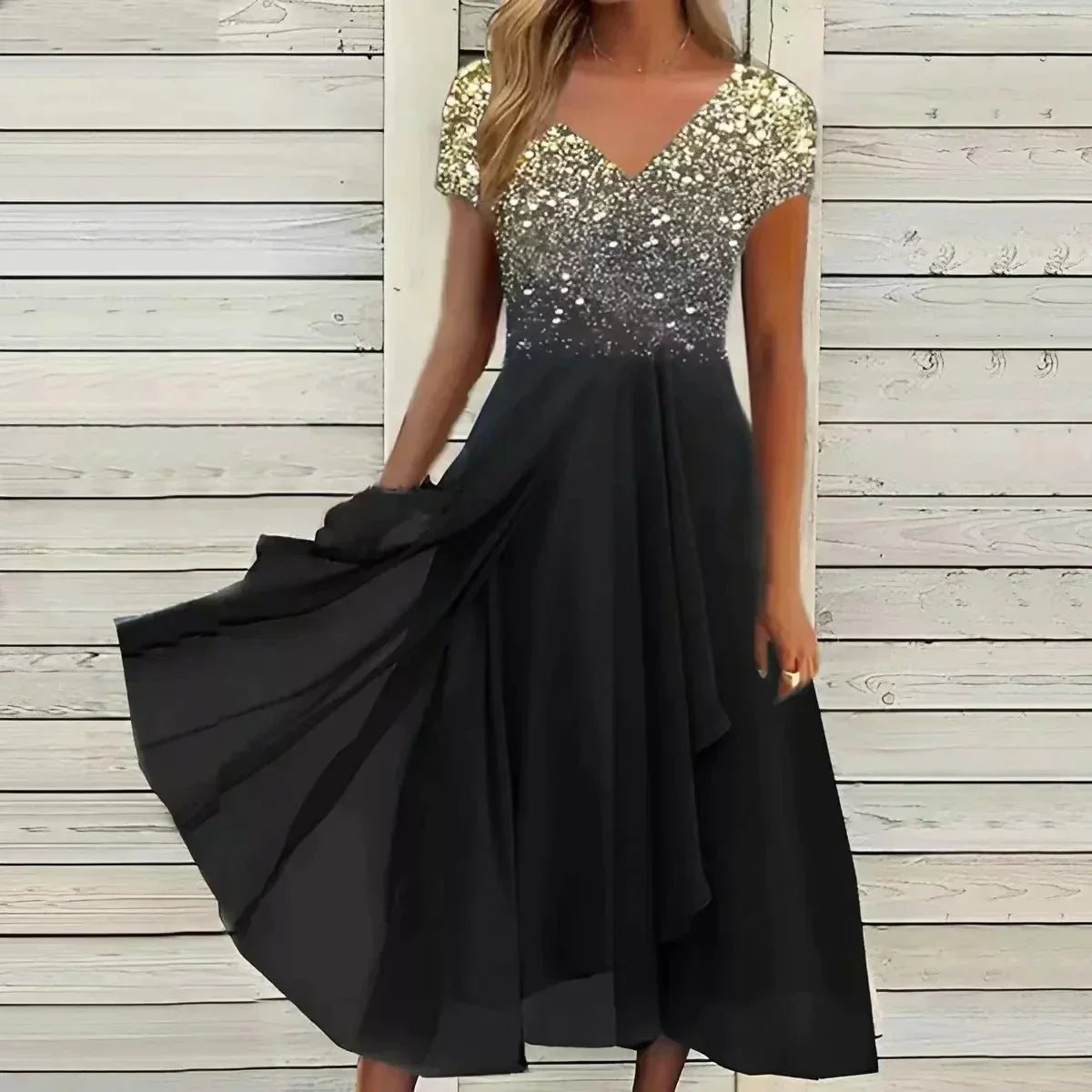 Elegant black evening dress with sparkling sequin bodice and flowing skirt, perfect for formal occasions. Women's fashion, party wear, stylish gown.