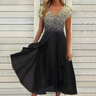 Elegant black evening dress with sparkling sequin bodice and flowing skirt, perfect for formal occasions. Women's fashion, party wear, stylish gown.