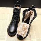 Black leather winter boots with faux fur lining, lace-up design, and side zipper, displayed on vintage newspaper background. Warm, stylish footwear.