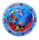 Colorful inflatable baby water play mat featuring ocean-themed graphics with a smiling shark, fish, and coral, ideal for sensory development.