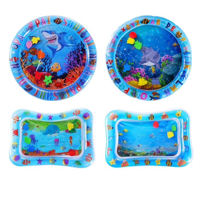 Colorful ocean-themed kids' inflatable play mats and pools featuring sharks, fish, and alphabet designs. Perfect for summer outdoor fun and learning.