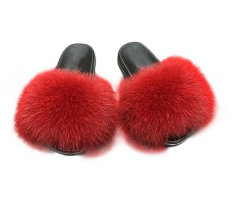 Red fluffy fur slippers with black soles, cozy indoor footwear, stylish home comfort, luxury faux fur slides, women's fashion accessories.