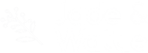 Logo of Jade & Wattle featuring a stylized white branch with leaves and berries on a transparent background, emphasizing natural and organic themes.