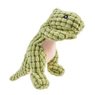 Green plush dinosaur toy with textured fabric, standing upright. Soft stuffed animal for kids, perfect for cuddling and imaginative play.