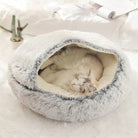 Fluffy gray cat bed with sleeping cat, cozy pet furniture, soft plush material, indoor use.