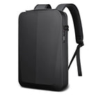 Sleek black anti-theft backpack with hard shell design, featuring a built-in combination lock, ergonomic straps, and minimalist style for tech-savvy travelers.