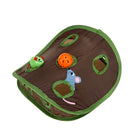 Interactive cat toy with green and brown fabric, featuring a mouse design, holes, and an orange ball. Ideal for playful kittens and active cats.