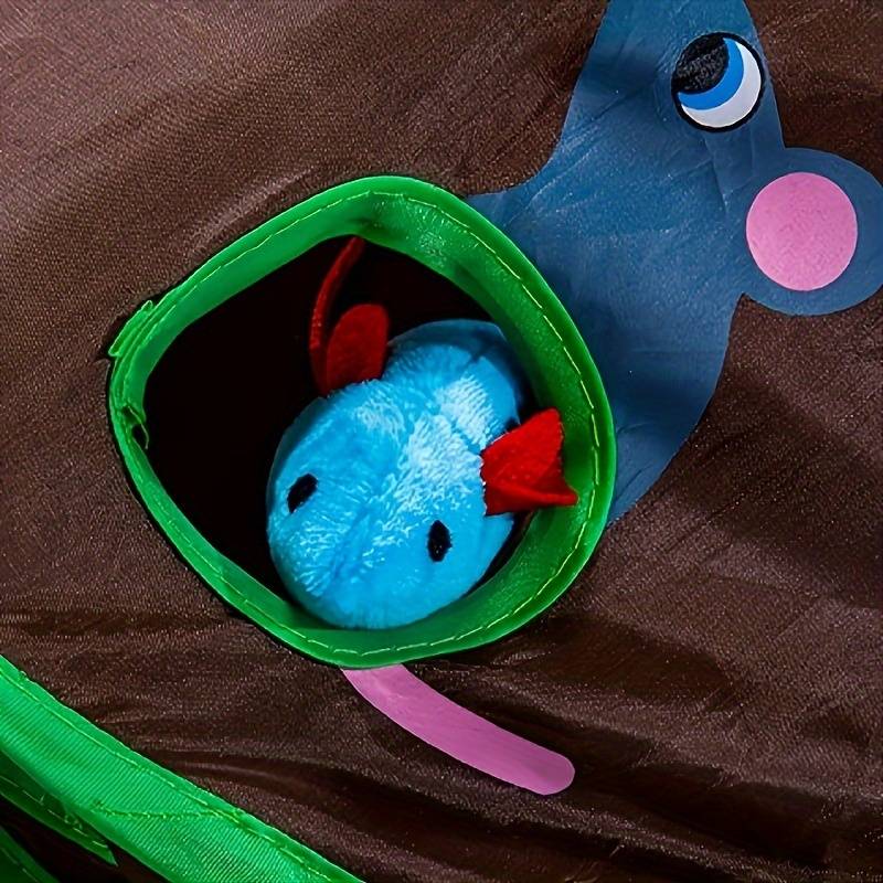 Interactive cat toy with a blue plush mouse peeking from a green tunnel, designed for playful feline engagement and mental stimulation.