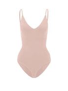 Nude seamless bodysuit with adjustable straps, V-neckline, and smooth finish. Perfect for layering, shapewear, or casual wear.