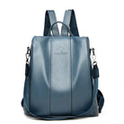 Sky blue leather backpack with adjustable straps, top handle, and silver hardware. Stylish, durable, and perfect for travel or daily use.