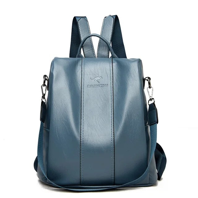 Sky blue leather backpack with adjustable straps, top handle, and silver hardware. Stylish, durable, and perfect for travel or daily use.