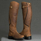 Brown PU leather knee-high boots with zipper and buckle detail, retro casual design, low heel, women's fashion footwear.