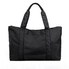 Black nylon tote bag with dual handles, spacious interior, and front pocket. Ideal for travel, shopping, or daily use. Durable and stylish design.