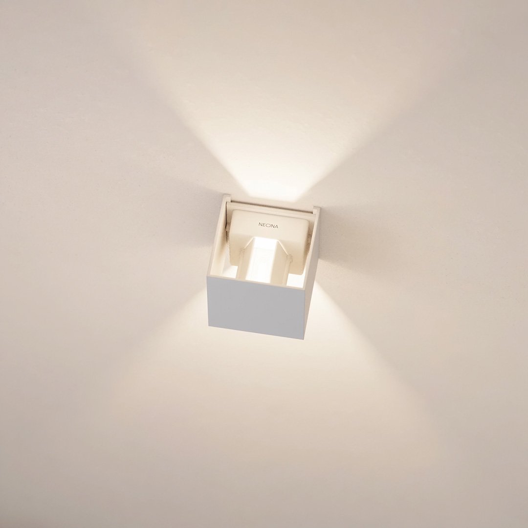 Modern square ceiling light fixture with minimalist design, emitting soft ambient light. Ideal for contemporary home lighting solutions.