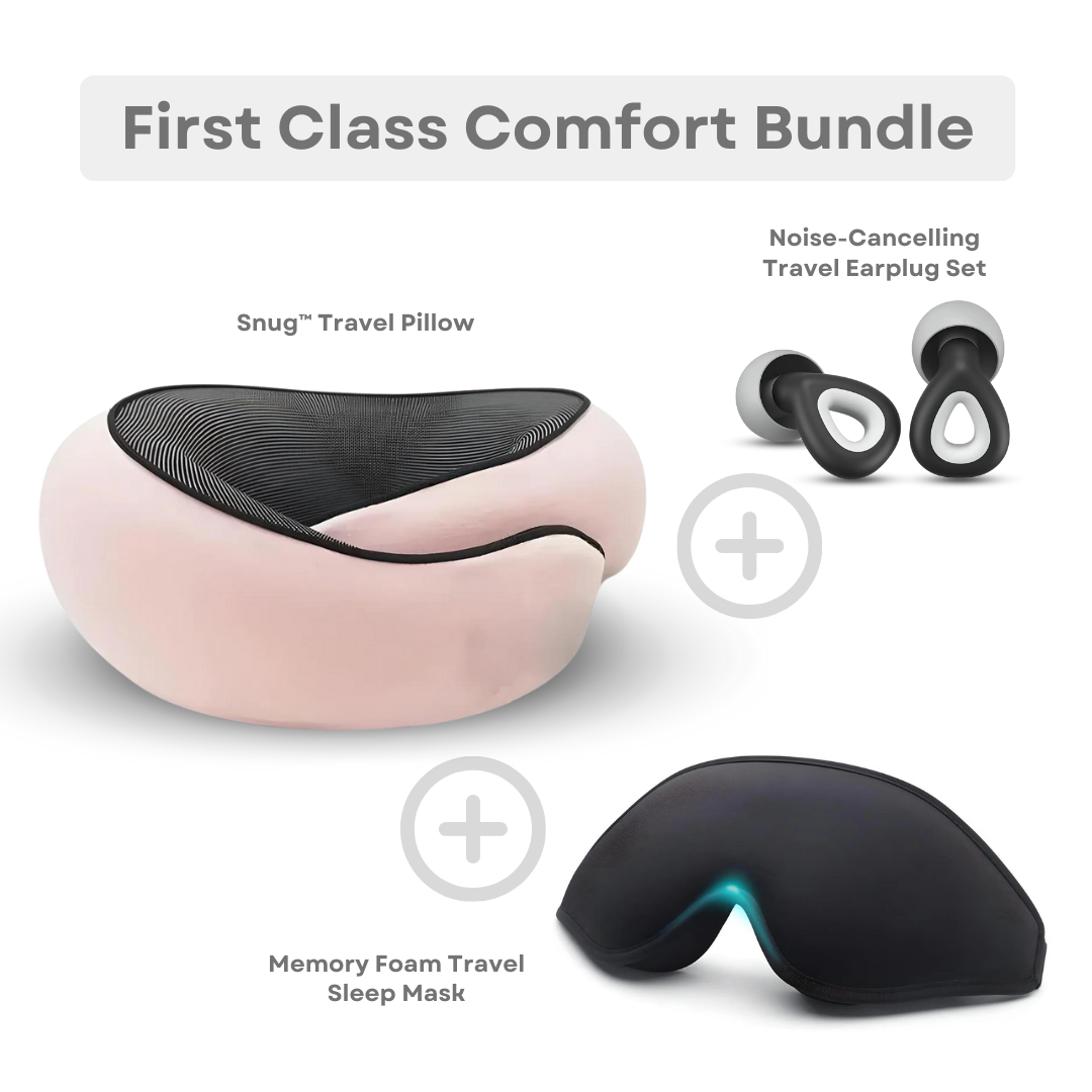 First Class Comfort Bundle featuring a pink Snug™ travel pillow, noise-cancelling earplugs, and a memory foam sleep mask for ultimate travel relaxation.