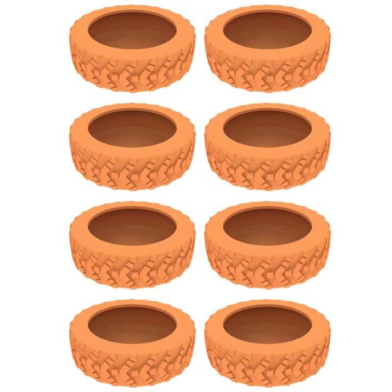 Eight orange tire planters with textured tread pattern, arranged in two columns. Ideal for garden decor, upcycled tire planters, eco-friendly gardening.