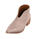 Beige suede ankle boot with low block heel, V-cut design, and stitched detailing. Perfect for casual wear. Women's fashion footwear.