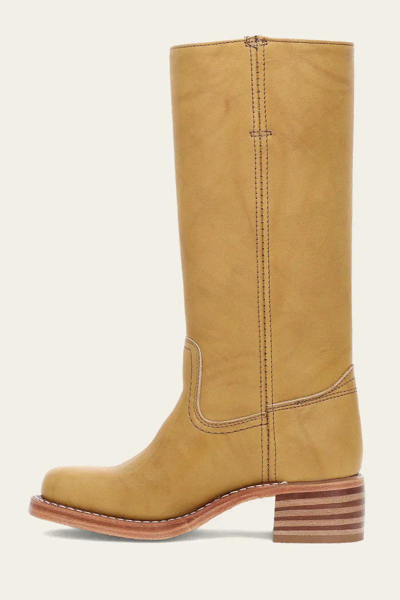 Tan leather knee-high boot with stacked wooden heel, side stitching, and round toe. Stylish women's footwear, perfect for casual or formal wear.