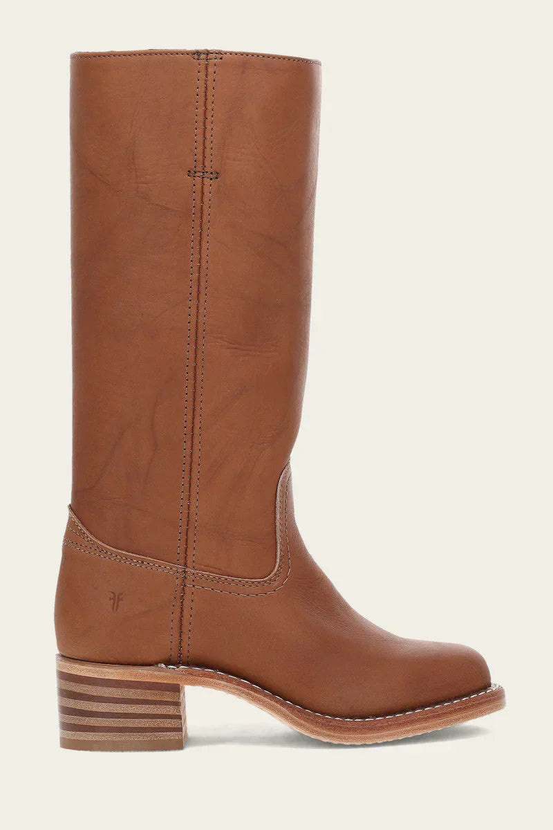 Brown leather cowboy boot with stacked heel, side stitching, and round toe. Western style footwear, durable design, perfect for casual or ranch wear.