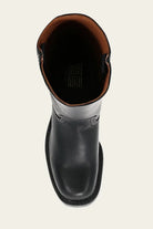 Top view of a black leather boot with brown interior, featuring a classic design. Perfect for fashion enthusiasts seeking durable, stylish footwear.