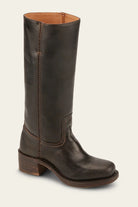 Brown leather knee-high boot with block heel, featuring detailed stitching. Stylish women's footwear, perfect for fall fashion and outdoor wear.