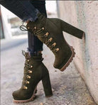 Olive green suede high-heeled boots with gold eyelets and rugged soles, paired with distressed jeans, showcasing trendy fall fashion footwear.