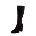 Black suede knee-high boot with block heel, side view on white background. Women's fashion footwear, elegant design, perfect for fall and winter outfits.