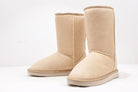 Beige suede winter boots with plush lining, flat soles, and mid-calf height, perfect for cold weather. Cozy, stylish footwear for women.