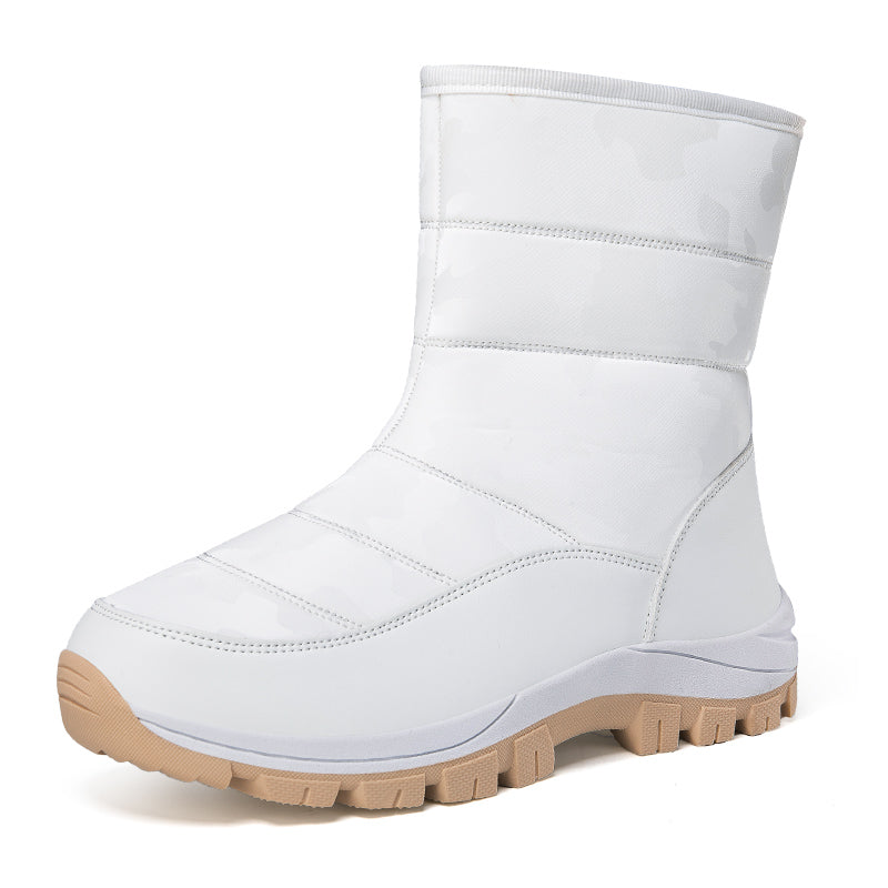 White winter snow boot with beige sole, insulated for warmth, featuring a quilted design. Ideal for cold weather, outdoor activities, and fashion.