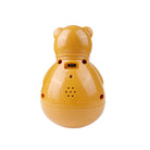 Yellow bear-shaped night light with switch, battery compartment, and speaker on the back. Ideal for children's room decor and soothing bedtime ambiance.