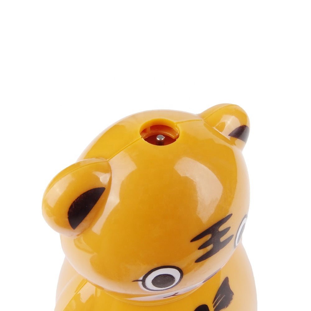 Yellow ceramic bear-shaped coin bank with cartoon eyes and black stripes, ideal for kids' savings. Cute piggy bank, children's room decor.