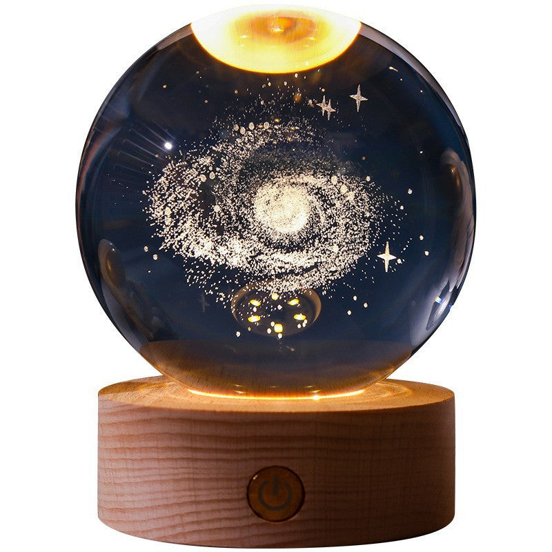 Crystal ball lamp with galaxy design on wooden base, LED light, home decor, night light, celestial theme, unique gift idea, modern interior accessory.