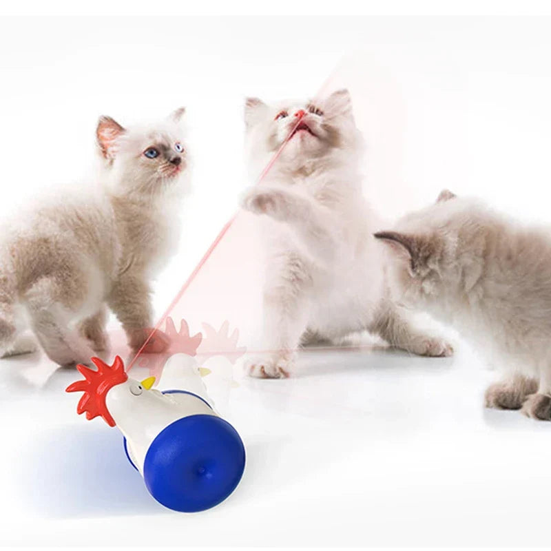 Three playful kittens interact with a chicken-shaped laser toy, emitting a red beam. Perfect for pet entertainment and interactive cat play.