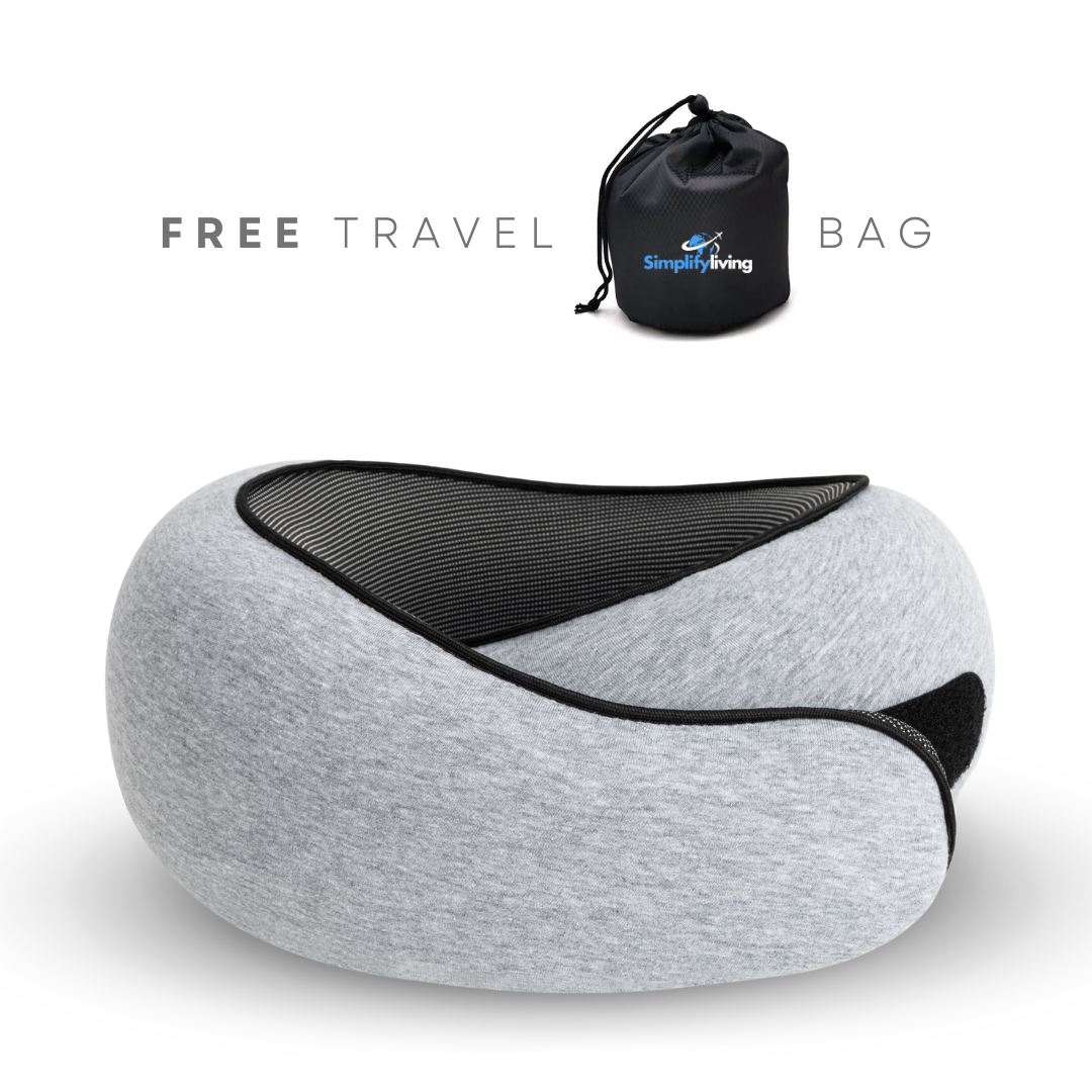 Gray memory foam travel neck pillow with black mesh panel, ergonomic design for comfort. Includes free black drawstring travel bag. Perfect for flights.