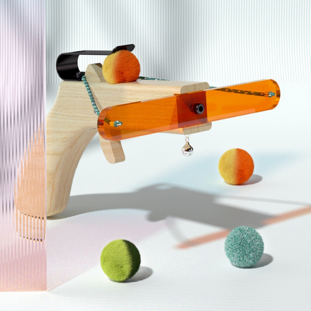 Cat toy ball launcher with orange acrylic, wooden handle, and colorful plush balls. Interactive pet toy for cats, creative play, and exercise.